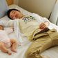 Father and child sleeping