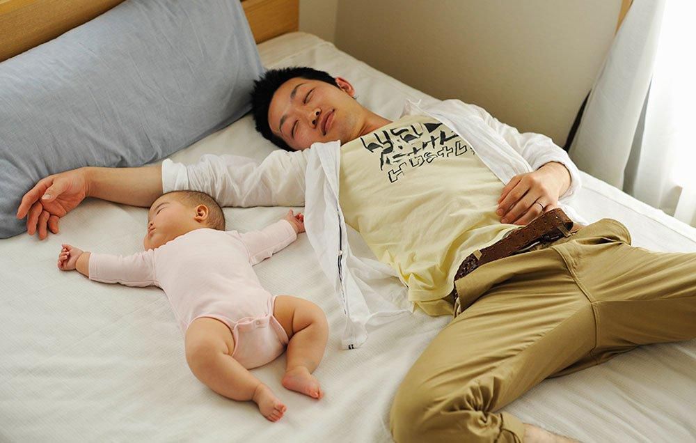 Father and child sleeping