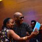 Simi and 2face trying to take a selfie