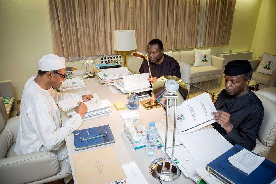 President Muhammadu Buhari (left), Minister of Budget and National Planning, Udoma Udo Udoma (middle), and Yemi Osinbajo (right)