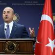 Turkish Foreign Minister Mevlut Cavusoglu said Athens and the Greek Cypriot side had to "wake up" from the notion that Ankara would withdraw its troops