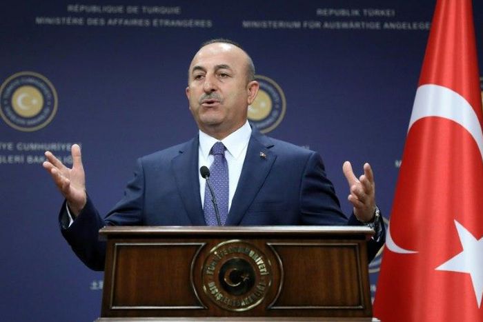 Turkish Foreign Minister Mevlut Cavusoglu said Athens and the Greek Cypriot side had to "wake up" from the notion that Ankara would withdraw its troops