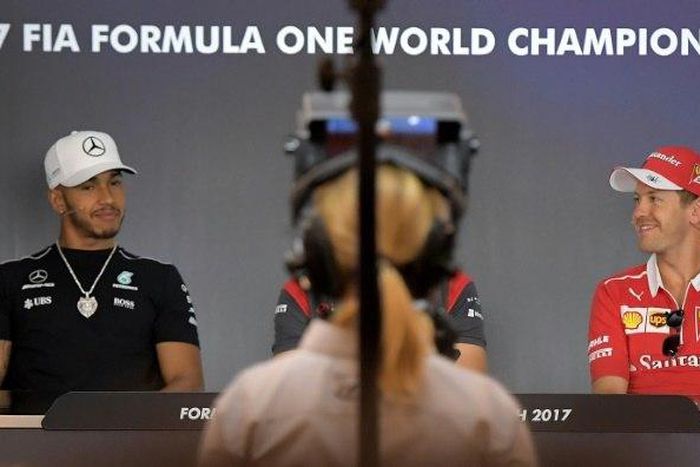 Sebastian Vettel (R) currently has a 20 point lead over Lewis Hamilton, who will be competing in front of a home crowd at the British Grand Prix