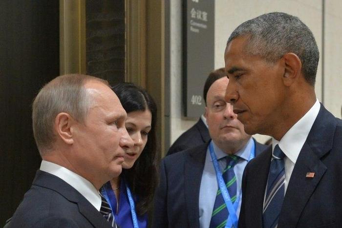 Russian President Vladimir Putin (L) meets with then-US President Barack Obama on the sidelines of the G20 Leaders Summit in Hangzhou on September 5, 2016
