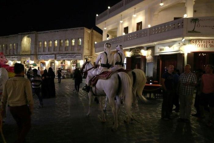 Mounted police patrol the popular Souq Waqif market, in the Qatari capital, Doha