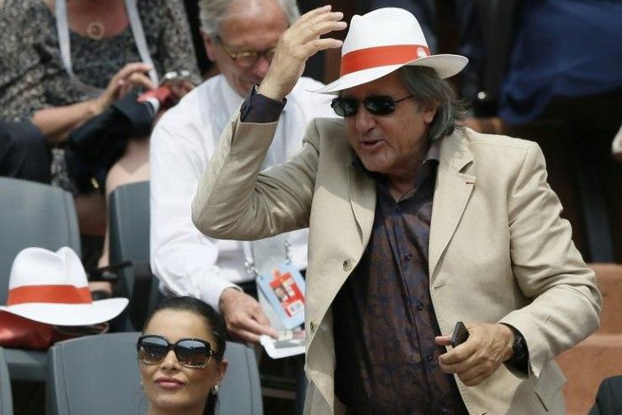 According to reports, Romanian former tennis player Ilie Nastase (R), pictured in June 2013, swore at the umpire, then Britain's pregnant captain Anne Keothavong and their number one player Johanna Konta