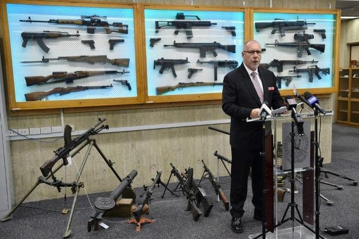 Detective Chief Inspector Wayne Hoffman of the New South Wales Police speaks to the media about firearms surrendered under a national amnesty