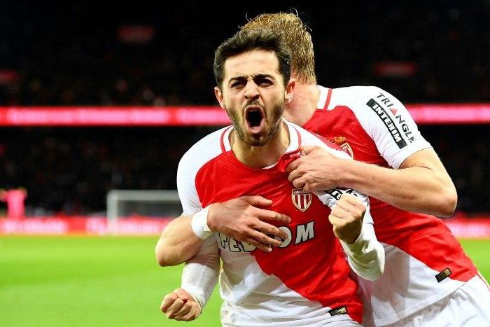 Monaco's Portuguese midfielder Bernardo Silva (C) celebrates after scoring a goal during the French L1 football match between Paris Saint-Germain and Monaco on January 29, 2017