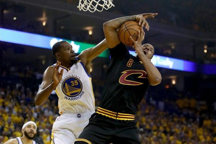 Kevin Durant (L) of the Golden State Warriors fights for the ball with Channing Frye of the Cleveland Cavaliers in game two of the 2017 NBA Finals, at ORACLE Arena in Oakland, California, on June 4