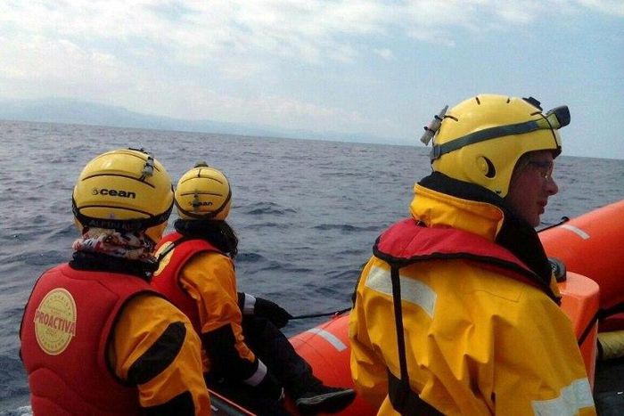 Spanish humanitarian NGO Proactiva Open Arms' members search to rescue migrants on the coast of the island of Lesbos
