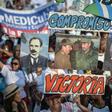 People display posters of (L to R) Cuban hero Jose Marti, Raul and Fidel Castro and current president Miguel Diaz-Canel during a May Day rally in 2018