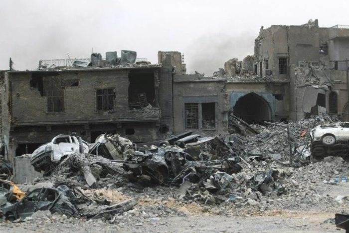 Islamic State group fighters -- including foreign jihadists -- are mounting a desperate last stand in Iraq's Mosul, shown here on July 7, 2017
