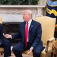 Outgoing White House Chief of Staff John Kelly, pictured with President Donald Trump in July 2017, told the Los Angeles Times that many migrants have been misled by traffickers