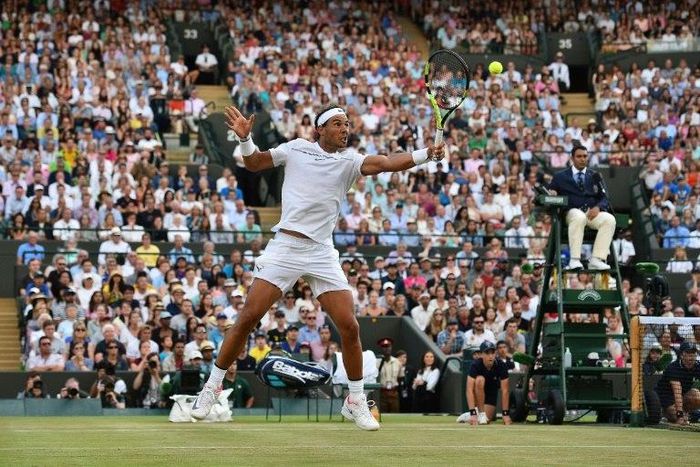 Spain's Rafael Nadal returns against Luxembourg's Gilles Muller at Wimbledon on July 10, 2017