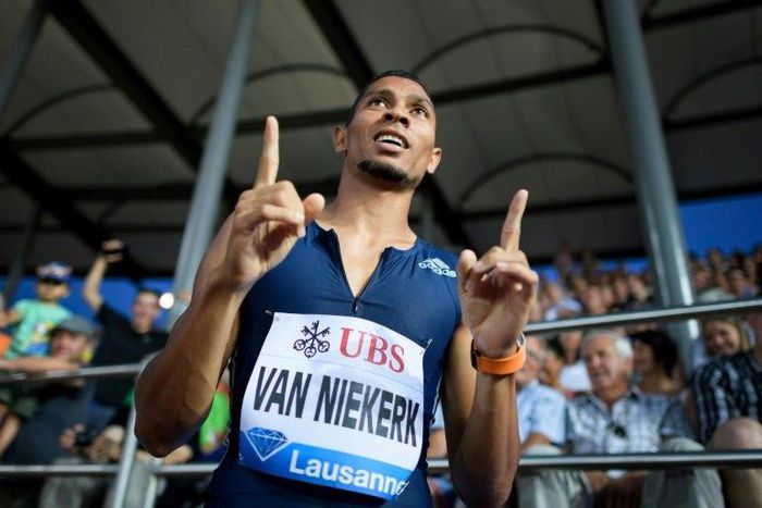 South Africa's Wayde Van Niekerk celebrates winning the mens' 400m event during the Diamond League athletics meeting Athletissima in Lausanne on July 6, 2017