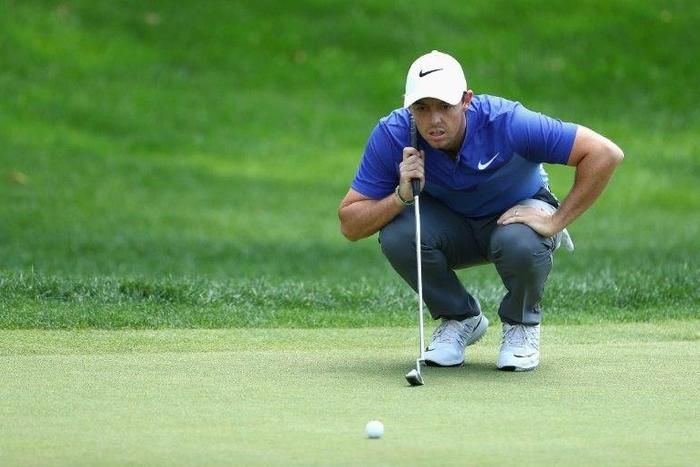 Rory McIlroy of Northern Ireland lines up a putt on the 18th green during the final round of the Travelers Championship at TPC River Highlands on June 25, 2017 in Cromwell, Connecticut