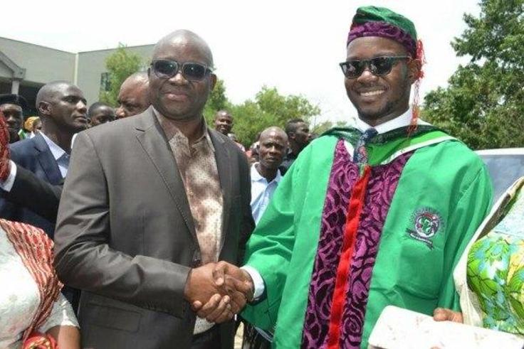 Governor Ayodele Fayose and his son.