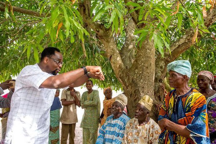 N-Power team interacting with volunteers and some farmers at a farm settlement in Osogbo.