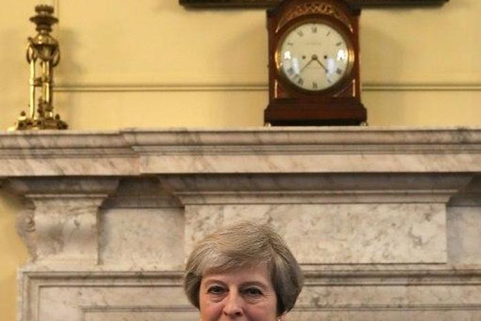 Britain's Prime Minister Theresa May, signs the official letter to European Council President Donald Tusk, invoking Article 50 and signalling the United Kingdom's intention to leave the EU