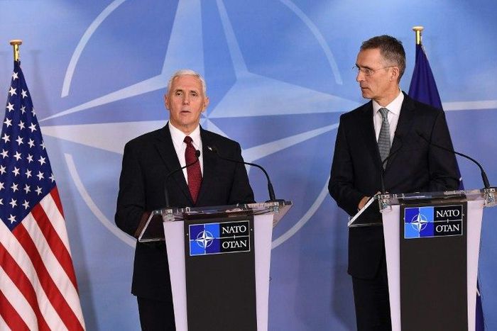NATO Secretray General Jens Stoltenberg (R) and US Vice-President Mike Pence (L) give a press conference after a meeting at the NATO headquarters in Brussels on February 20, 2017