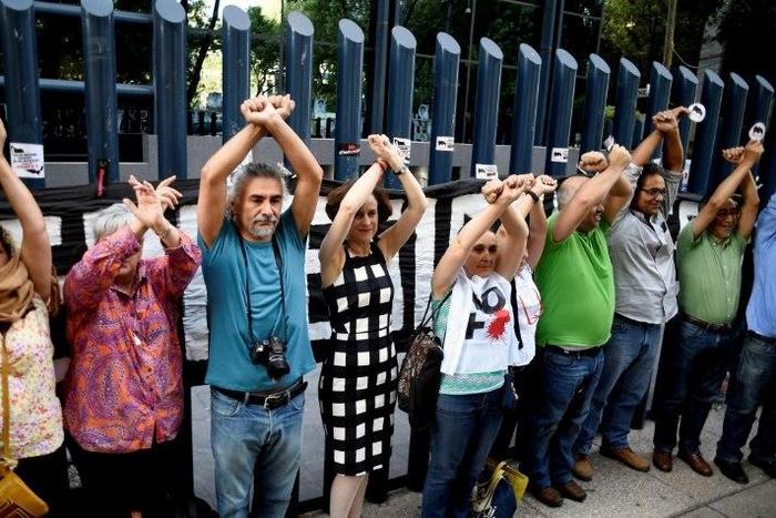 Leaders of Mexico's conservative party were targeted by the same spyware that the government is accused of using against journalists, an allegation that sparked protest from civil society activists and journalists, pictured on June 23, 2017