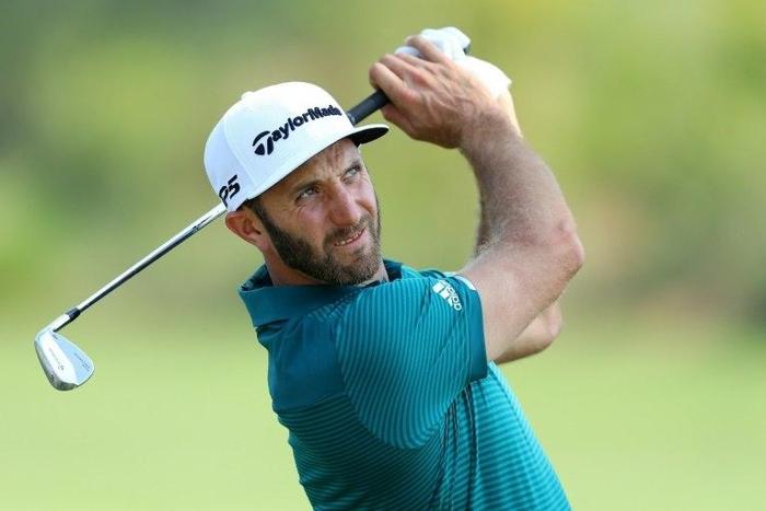 Dustin Johnson of the United States plays a shot during a practice round ahead fo The Players Championship at the Stadium course at TPC Sawgrass on May 10, 2017 in Ponte Vedra Beach, Florida