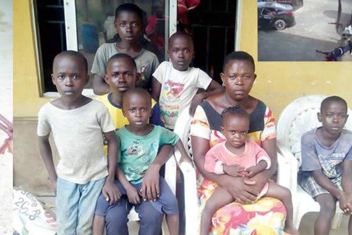 Late brave policeman, his wife, Mrs. Iboko and her children