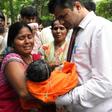 This file photo taken on August 12, 2017 shows relatives mourning the death of a child at the Baba Raghav Das Hospital in Gorakhpur, in the northern Indian state of Uttar Pradesh