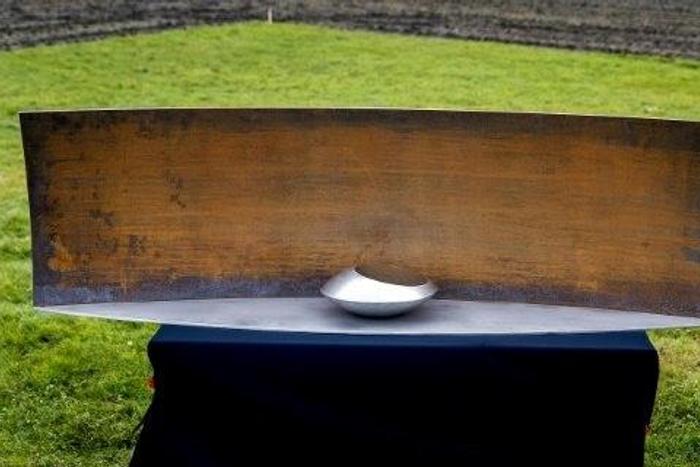 A picture taken on December 7, 2016 shows part of a national monument in memory of the victims of the downing of flight MH17 to be set up in Vijfhuizen, The Netherlands