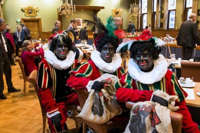 Dutch right wing PVV State members dress as Black Pete, the jolly sidekick of the Dutch Saint Nicholas, at a meeting in Province House in Groningen, The Netherlands