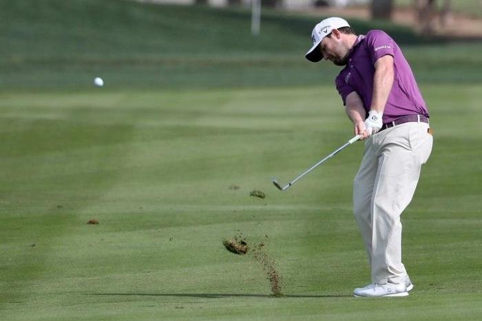Branden Grace hits a six-under par 66 for a one-stroke lead at the Texas Open