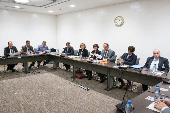Members of Syria's opposition delegation attend a meeting of Intra-Syria peace talks with the UN Special Envoy for Syria at Palais des Nations in Geneva on March 30, 2017