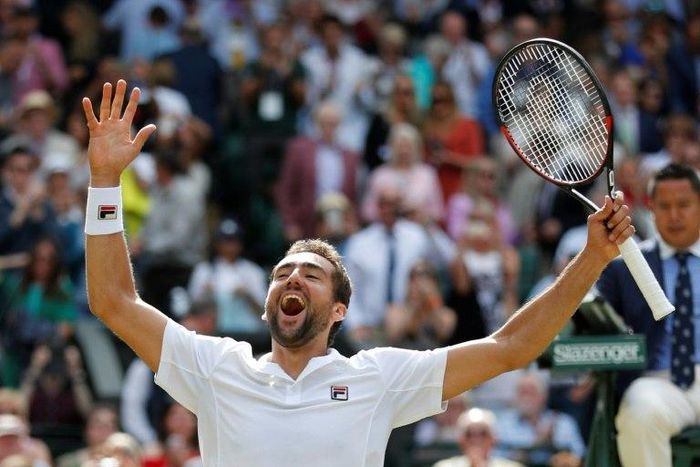 Croatia's Marin Cilic celebrates after beating his US opponent Sam Querrey during their Wimbledon men's singles semi-final match on July 14. Cilic won the match 6-7, 6-4, 7-6, 7-5