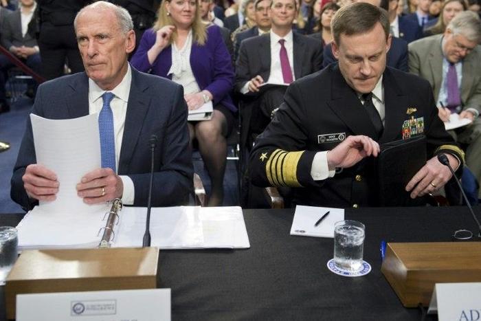National Security Agency (NSA) Director Michael Rogers (R) and Director of National Intelligence Dan Coats (L) testify before the Senate Intelligence Committee on the probes into Russia meddling in the US election