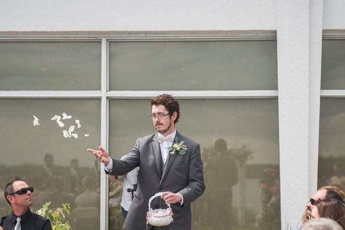 Casey throws petals on to the ground