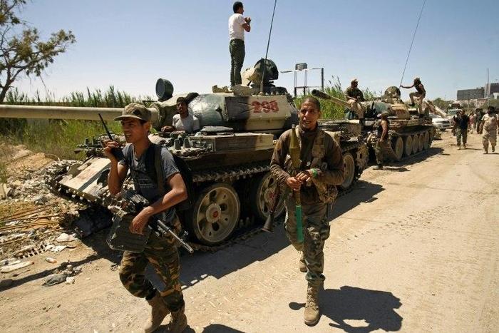Forces loyal to Libyan strongman Khalifa Haftar, pictured earlier in May 2017, carried out a "joint operation" with Egypt on jihadist camps in Libya's eastern city of Derna