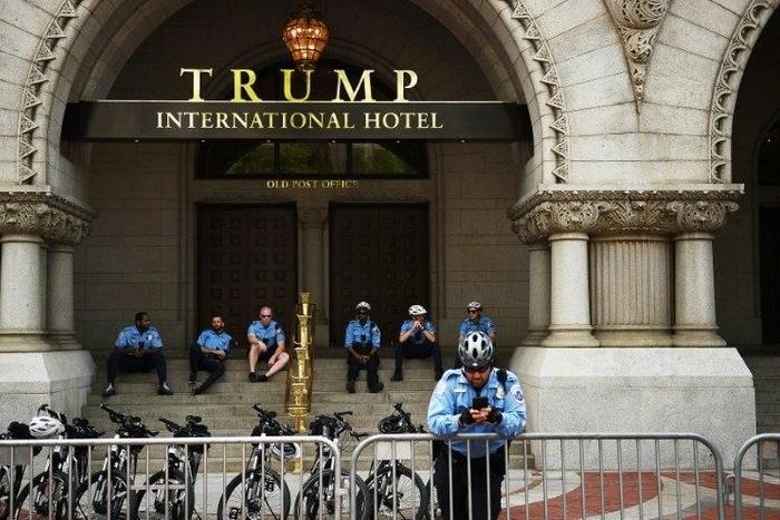 Police officers outside the Trump International Hotel in Washington DC