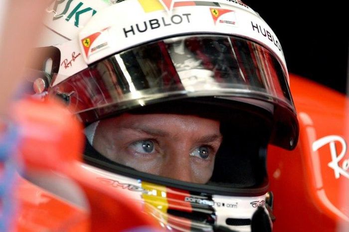 Ferrari's Sebastian Vettel sits in his car during practice for the Monaco Grand Prix, on May 25, 2017