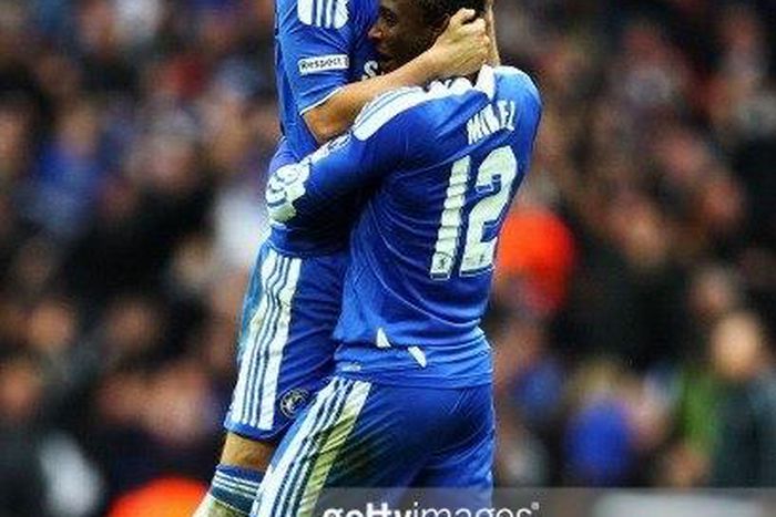 John Terry and John Obi Mikel of Chelsea celebrate victory in the FA Cup Final with Budweiser between Liverpool and Chelsea at Wembley Stadium on May 5, 2012 in London, England.