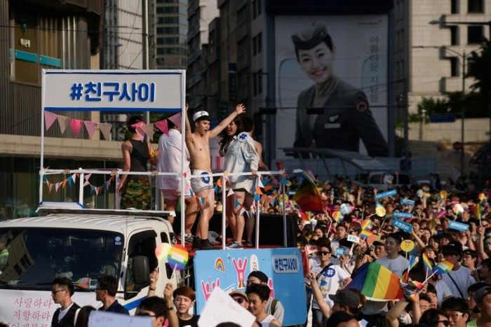 In last year's parade on June 28, 2015 participants dance and wave banners as part of the 'Korea Queer Festival' in Seoul