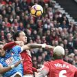 Manchester United's Zlatan Ibrahimovic (C) elbows Bournemouth's Tyrone Mings during the English Premier League match at Old Trafford, north west England, on March 4, 2017