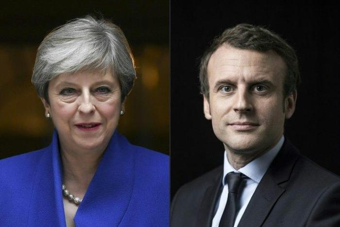 Britain's Prime Minister Theresa May, struggling after losing her parliamentary majority, will hold talks with French President Emmanuel Macron who appears to be on course for a strong parliamentary election result.