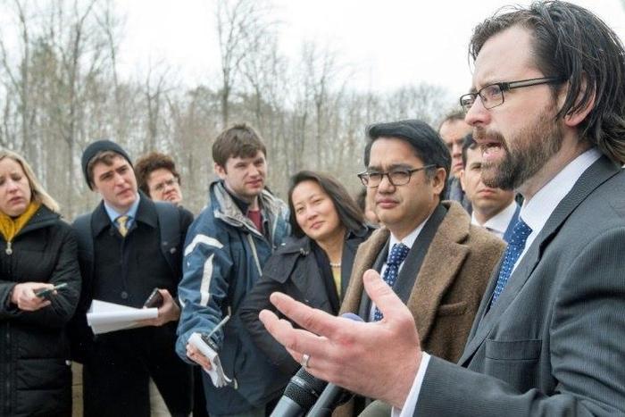 Attorneys for the ACLU, Omar Jadwat (L) and Justin Cox (R) deliver remarks to the media outside US District Court, Southern District of Maryland, March 15, 2017, in Greenbelt, Maryland