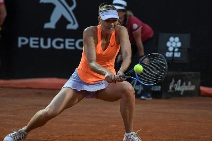 Russia's Maria Sharapova returns to Mirjana Lucic-Baroni of Croatia during their Rome ATP Tennis Open tournament on May 16, 2017 at the Foro Italico in Rome
