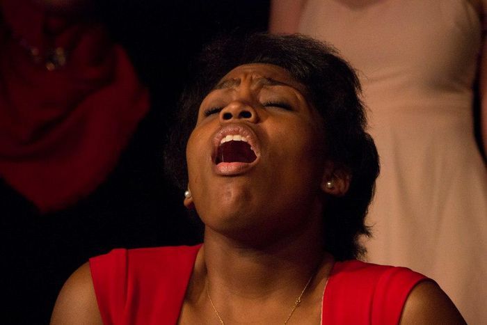 A woman with an expression of orgasm.