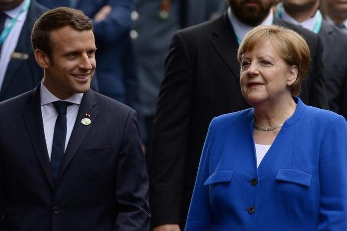 French President Emmanuel Macron and German Chancellor Angela Merkel, seen here during a G7 summit in Sicily, are the leaders of the EU's traditional twin engines.