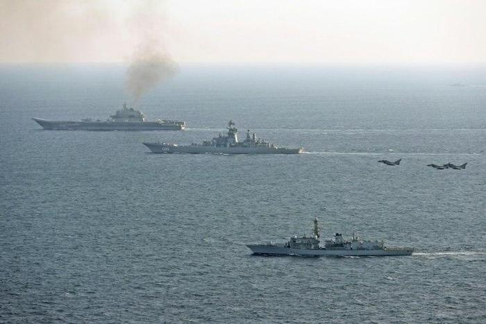 In a picture released by the British Ministry of Defence, UK ships and aircraft shadow the Russian Petr Velikiy (C) and the Russian Admiral Kuznetsov (top) as they pass through the English Channel January 24, 2017