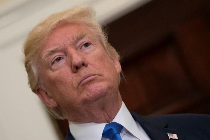 President Donald Trump urged his Mexican counterpart Enrique Pena Nieto not to say Mexico won't pay for the US leader's long-promised border wall