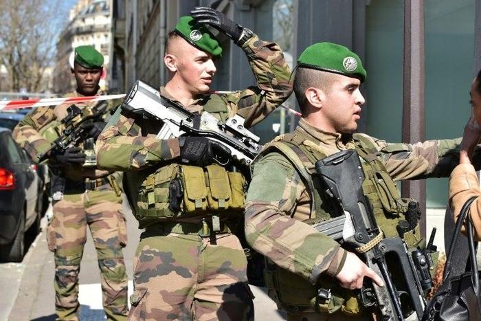 French troops on duty near the Paris offices of the International Monetary Fund on March 16, 2017