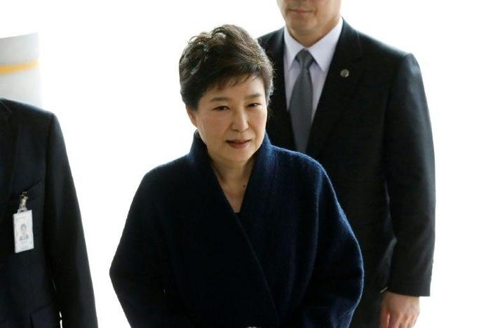 South Korean prosecutors seek an arrest warrant for ousted president Park Geun-Hye days after questioning her over the corruption and abuse of power scandal that brought her down